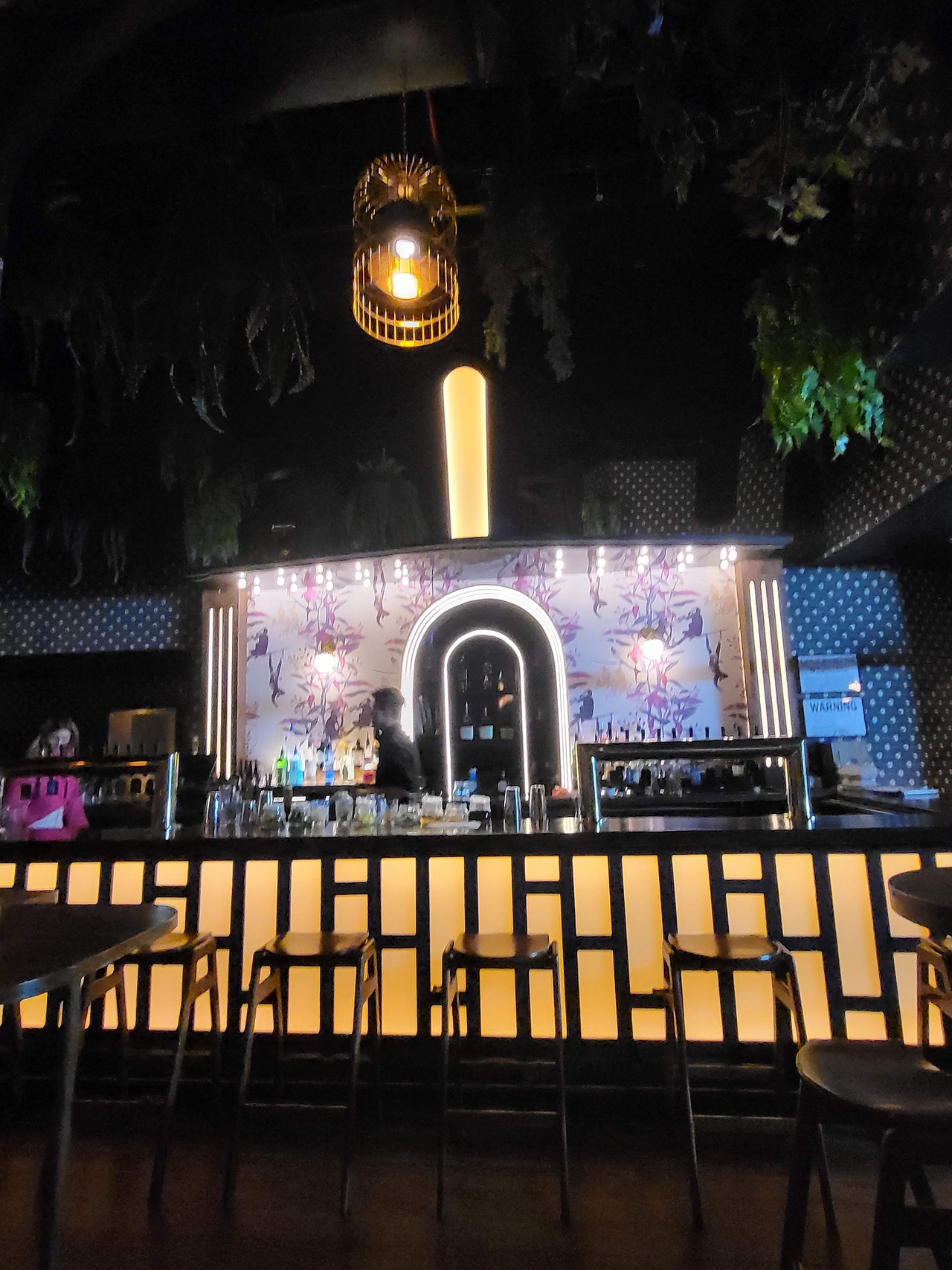An evocative and moody photo of the front room bar at Asylum NYC to showcase it as a desirable rental space for private events and corproate functions.